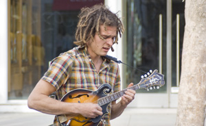Medium shot of a street musician